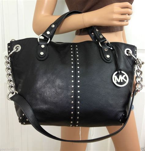 michael kors black combo|Michael Kors silver purses.